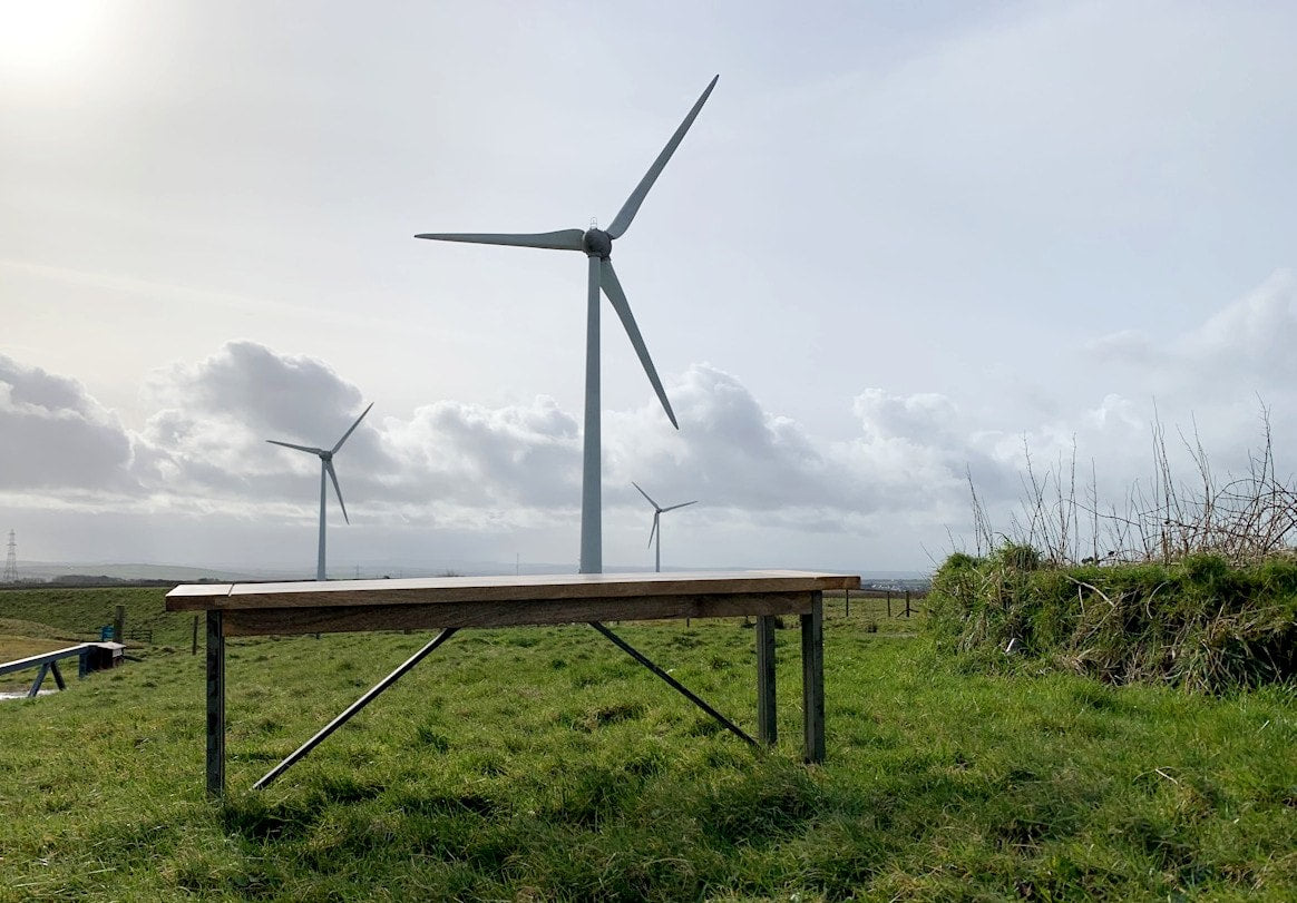 Extendable Rustic Hardwood Industrial Dining Table - Seats up to Twelve People