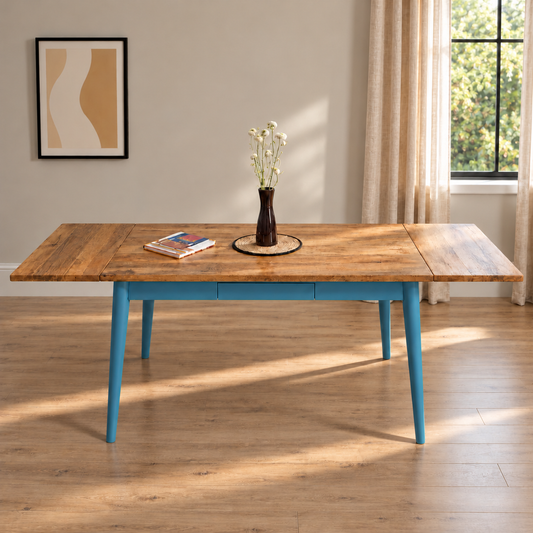 Wood dining table with painted legs and center seam, mid-century style